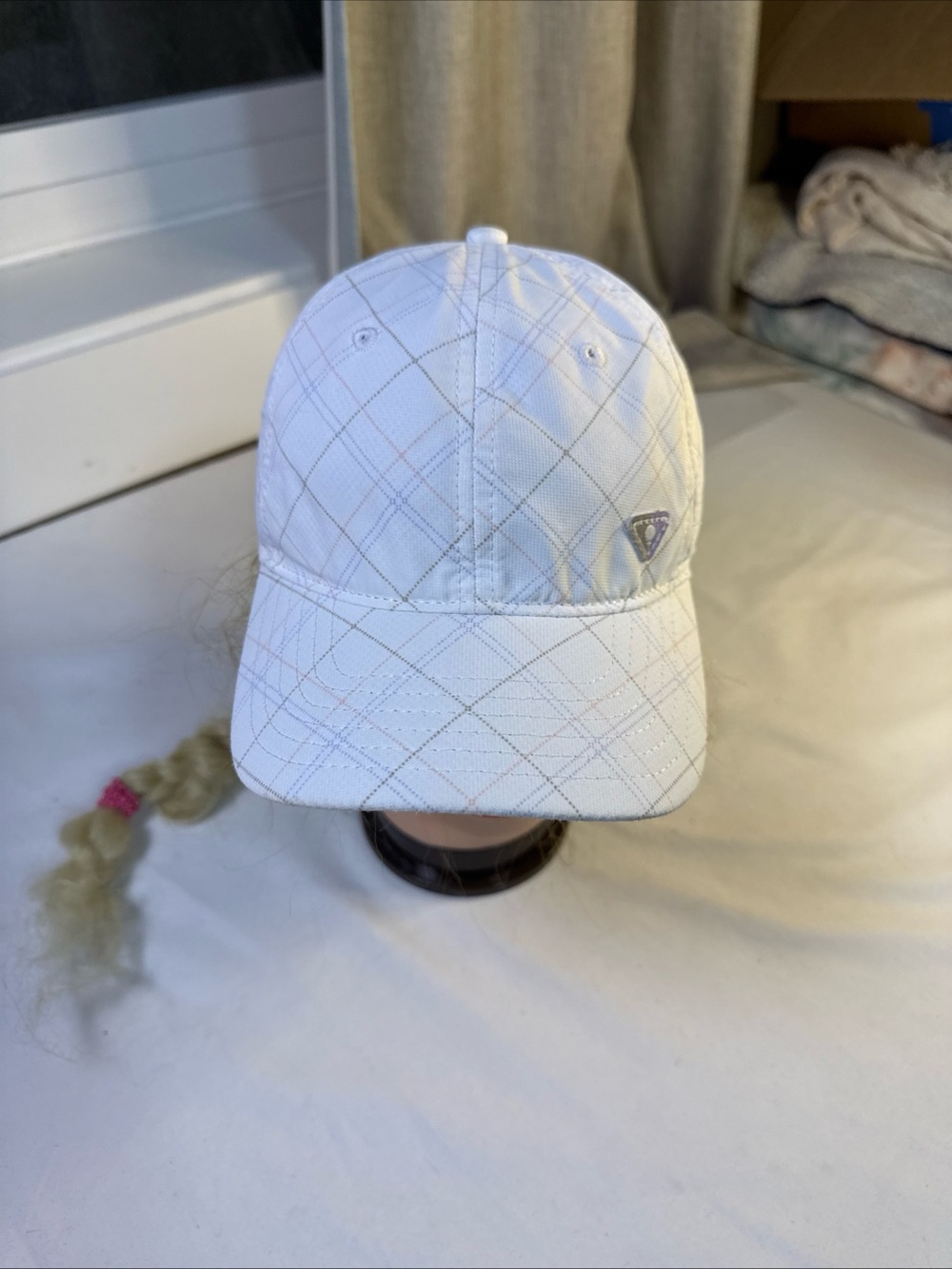 White lightweight golf/running Cap with Subtle golf Logo